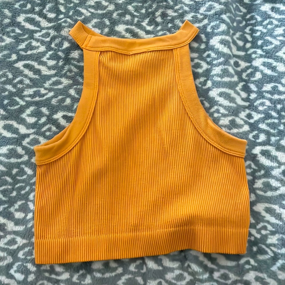 Cotton on crop top! It’s a bright orange color